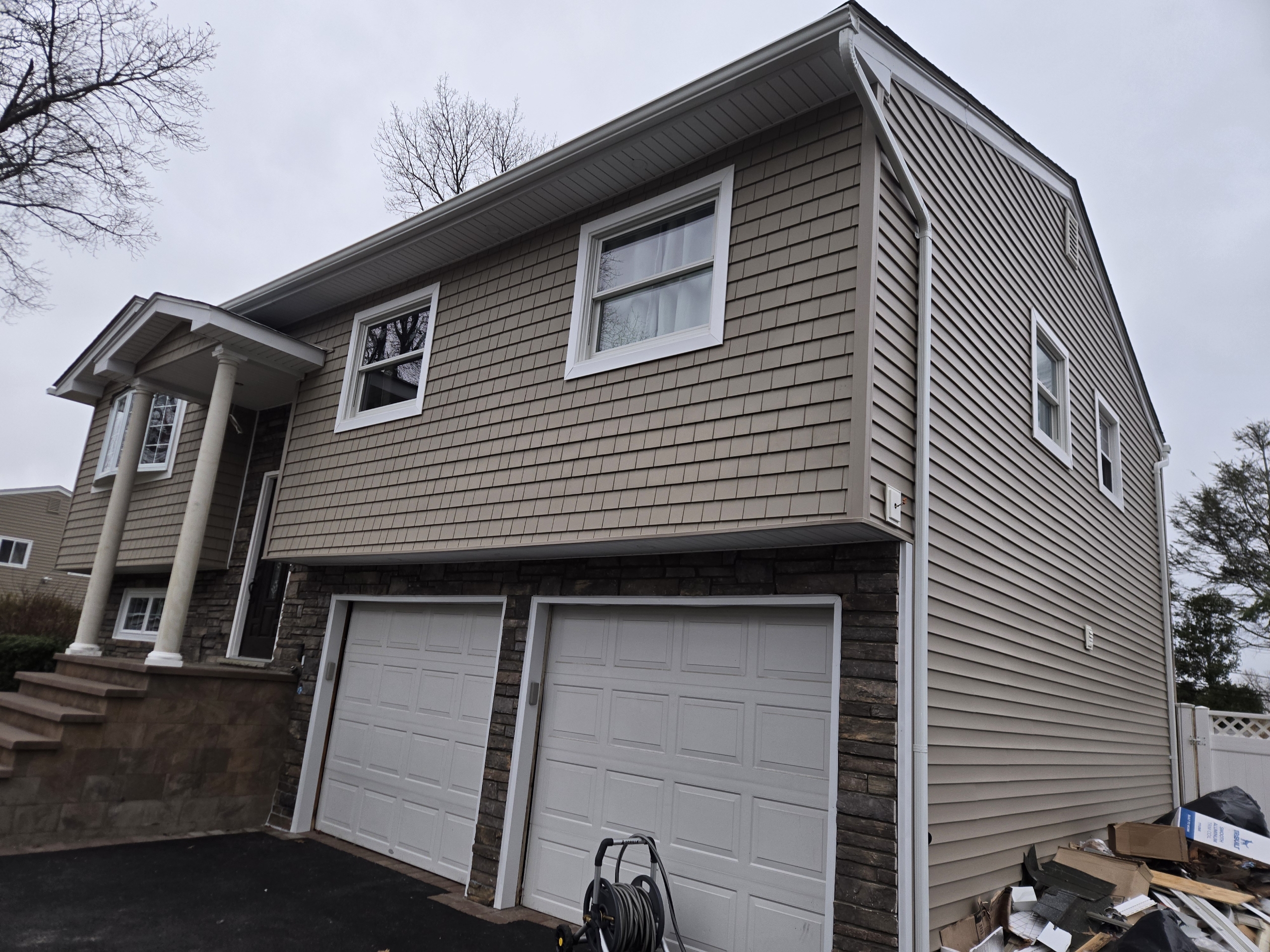 Tan vinyl siding Long Island