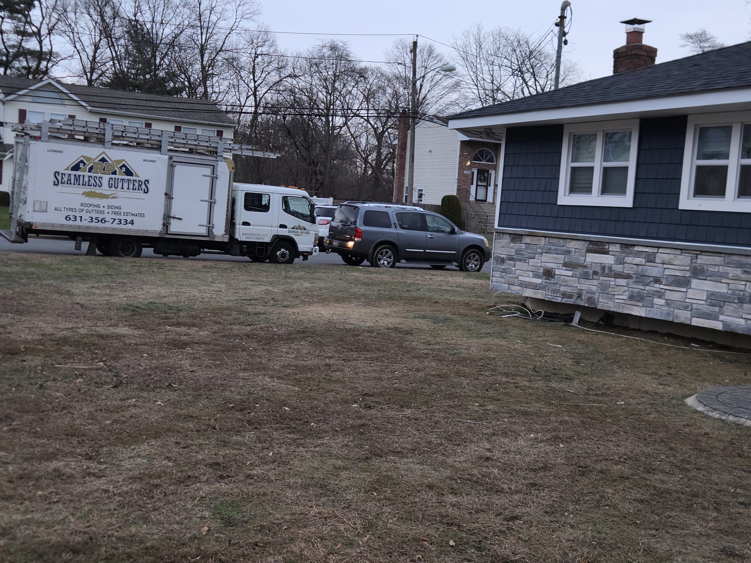 RP Seamless Gutters crew on site